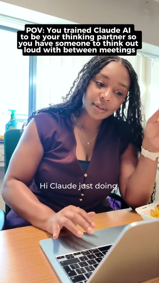 Shana at her desk demonstrating how she uses Claude as a thinking partner